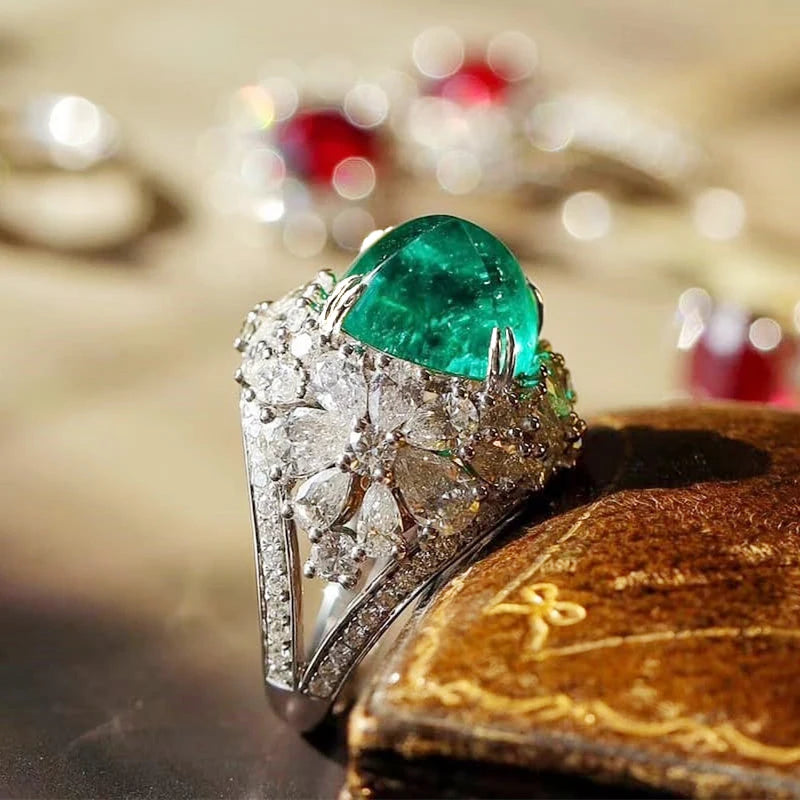 Emerald Bloom Ring: Luxurious Floral Design with Sparkling Zirconia