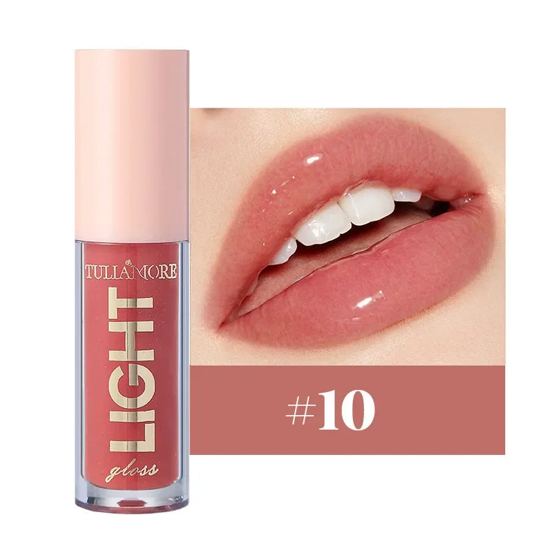 Discover the ultimate lip care with our lightweight moisturizing lip gloss. Non-sticky, waterproof, and long-lasting, it hydrates and enhances your lips with a luminous shine in 12 stunning shades.