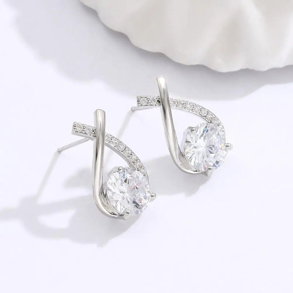 Elegant Crystal Cross Stud Earrings โ Timeless Gold Finish