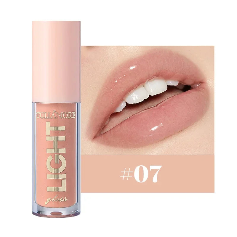Discover the ultimate lip care with our lightweight moisturizing lip gloss. Non-sticky, waterproof, and long-lasting, it hydrates and enhances your lips with a luminous shine in 12 stunning shades.