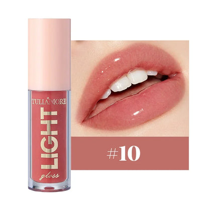 Discover the ultimate lip care with our lightweight moisturizing lip gloss. Non-sticky, waterproof, and long-lasting, it hydrates and enhances your lips with a luminous shine in 12 stunning shades.