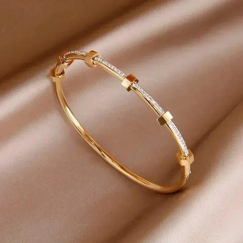 Timeless Round Cubic Zirconia Bangle: Elegance in Gold & Silver