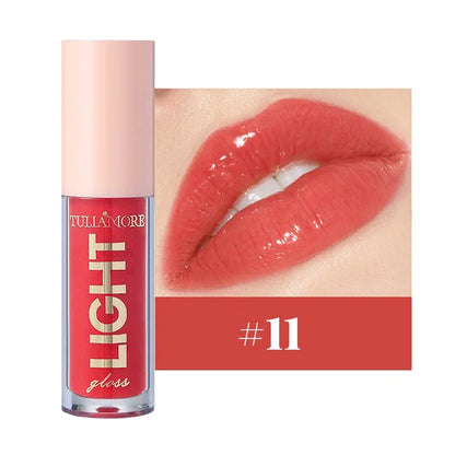 Discover the ultimate lip care with our lightweight moisturizing lip gloss. Non-sticky, waterproof, and long-lasting, it hydrates and enhances your lips with a luminous shine in 12 stunning shades.