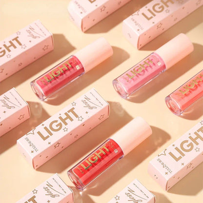 Discover the ultimate lip care with our lightweight moisturizing lip gloss. Non-sticky, waterproof, and long-lasting, it hydrates and enhances your lips with a luminous shine in 12 stunning shades.