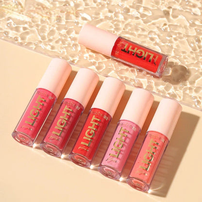 Discover the ultimate lip care with our lightweight moisturizing lip gloss. Non-sticky, waterproof, and long-lasting, it hydrates and enhances your lips with a luminous shine in 12 stunning shades.