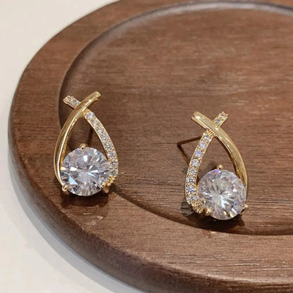 Elegant Crystal Cross Stud Earrings – Timeless Gold Finish
