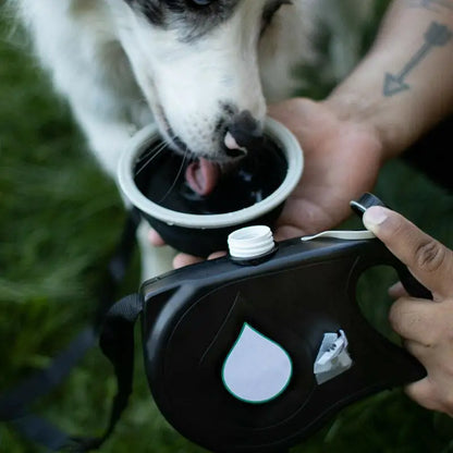 3-in-1 Smart Dog Leash – Water Bottle, Waste Bag Holder & Tangle-Free Control