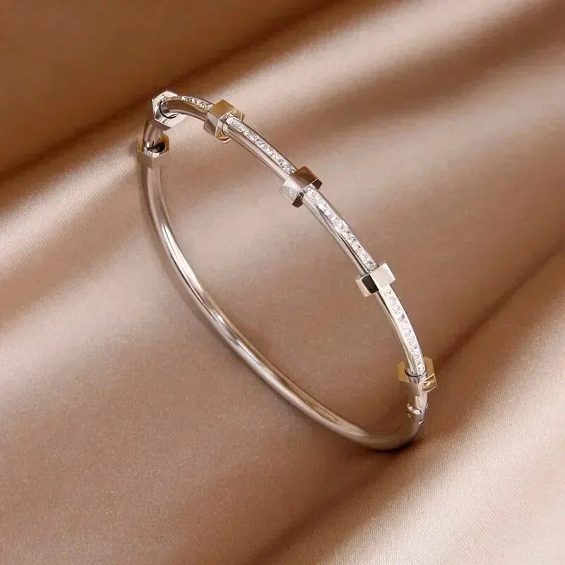 Timeless Round Cubic Zirconia Bangle: Elegance in Gold & Silver